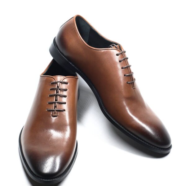 Sleek brown leather wholecut Oxfords for men