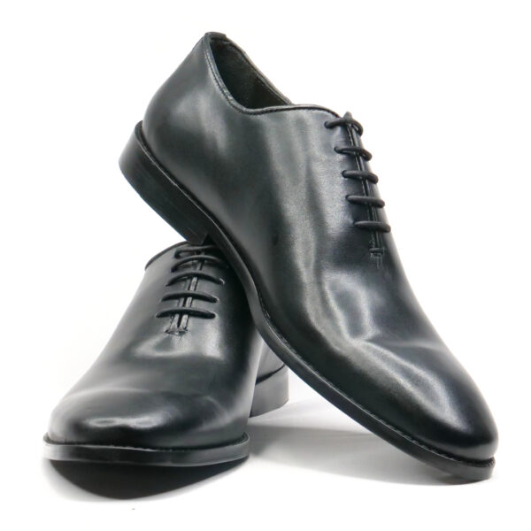 Sleek black leather wholecut Oxford dress shoes for men